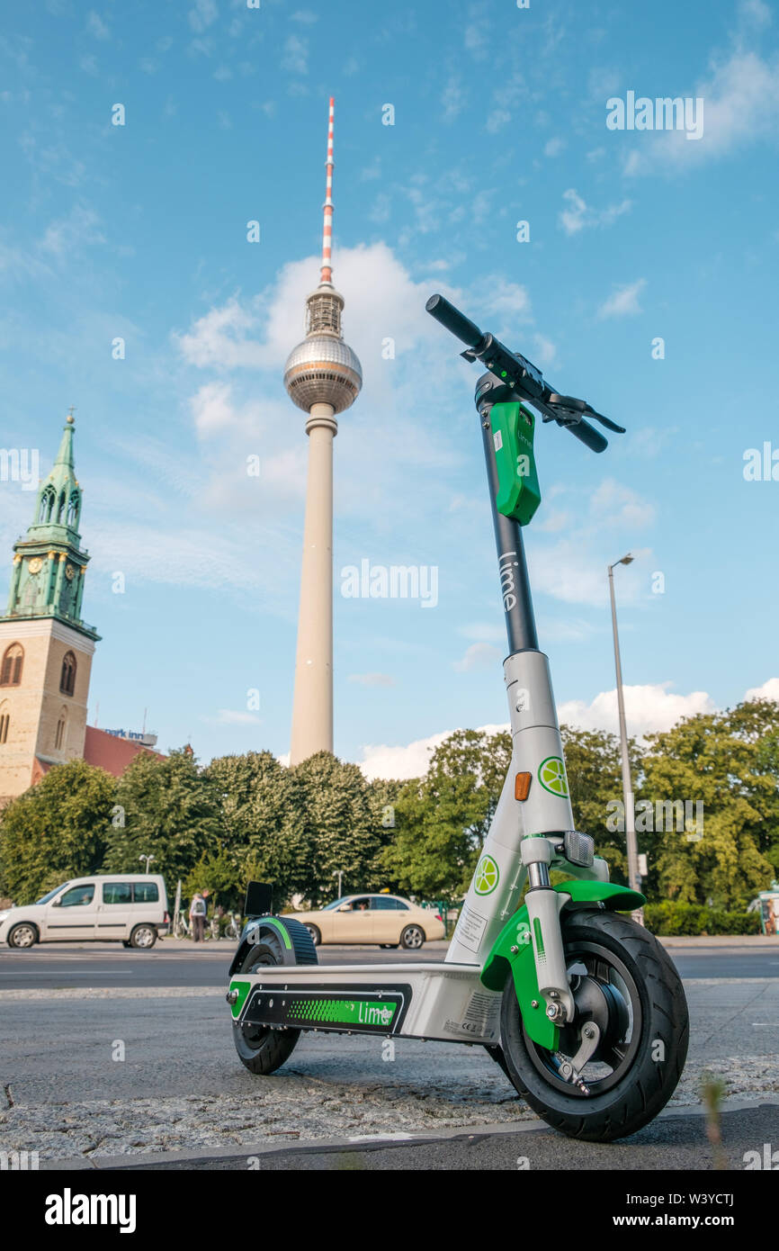 Berlin, Germany - Electric scooter , escooter or e-scooter of the ride sharing company LIME on sidewalk in Berlin, Germany Stock Photo - Alamy