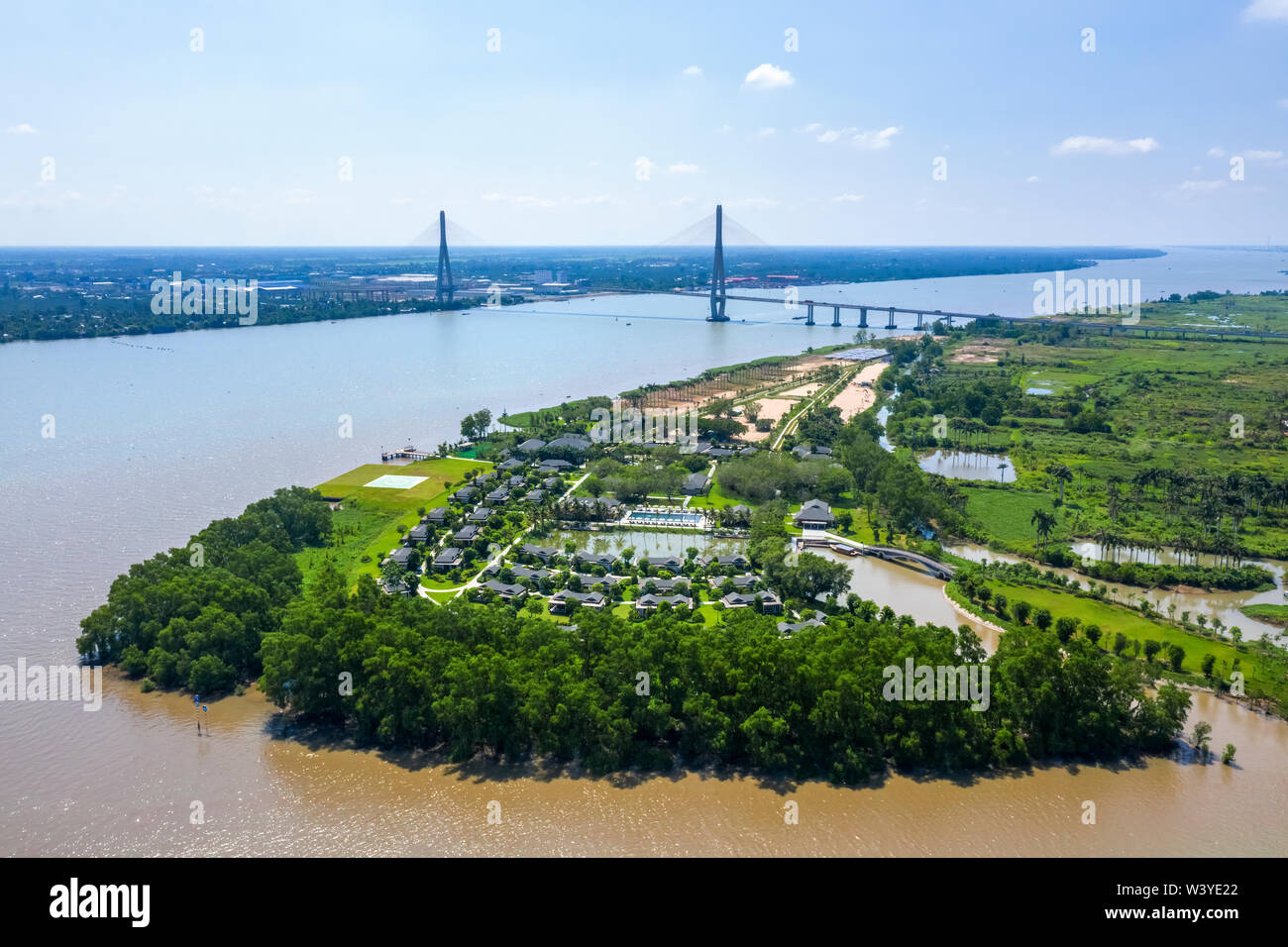 Top view aerial view of Can Tho bridge, Can Tho City with development buildings, transportation, energy power infrastructure. Stock Photo