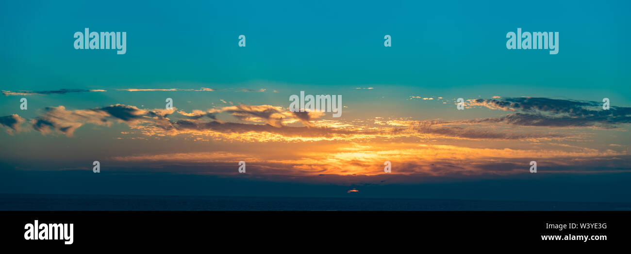 Dramatic sunset sky with clouds Stock Photo - Alamy