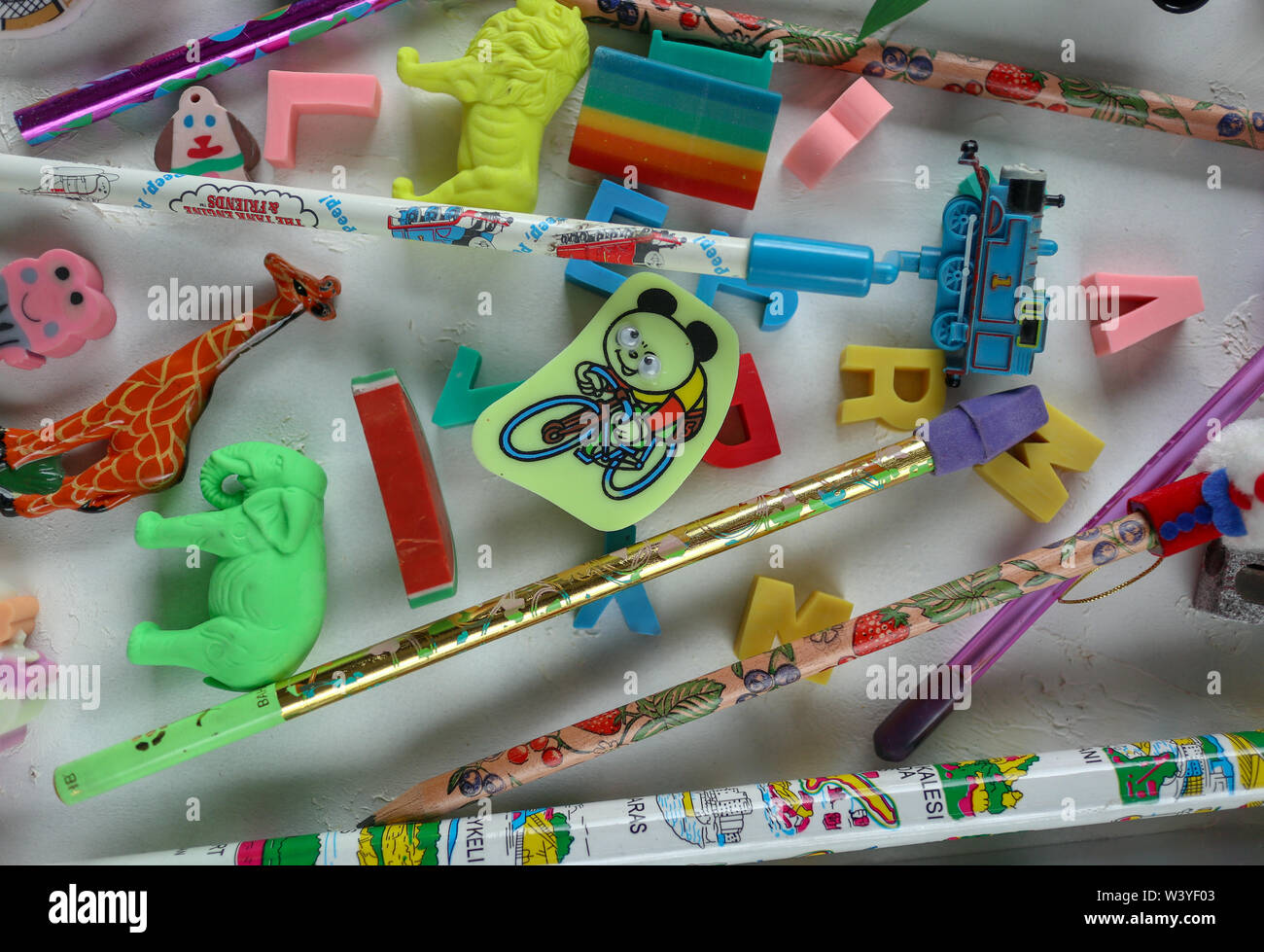 background, fun pencils and erasers for kids Stock Photo Alamy