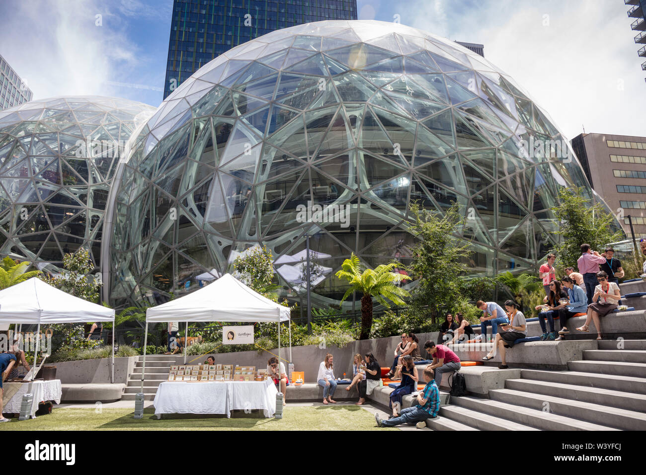 Amazon employees outside the Amazon Spheres, Amazon headquarters campus, Seattle, Washington, United States of America Stock Photo