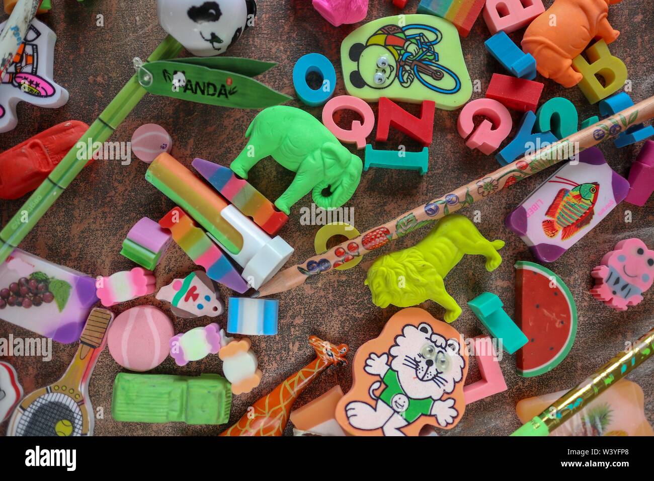 background, fun pencils and erasers for kids Stock Photo Alamy