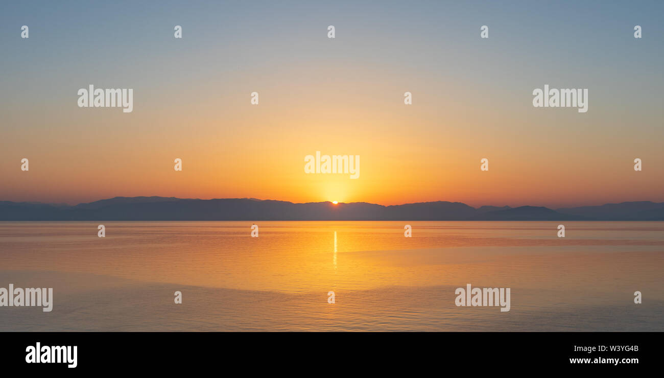 Sunrise at Epir Mountains and Ionian Sea Stock Photo