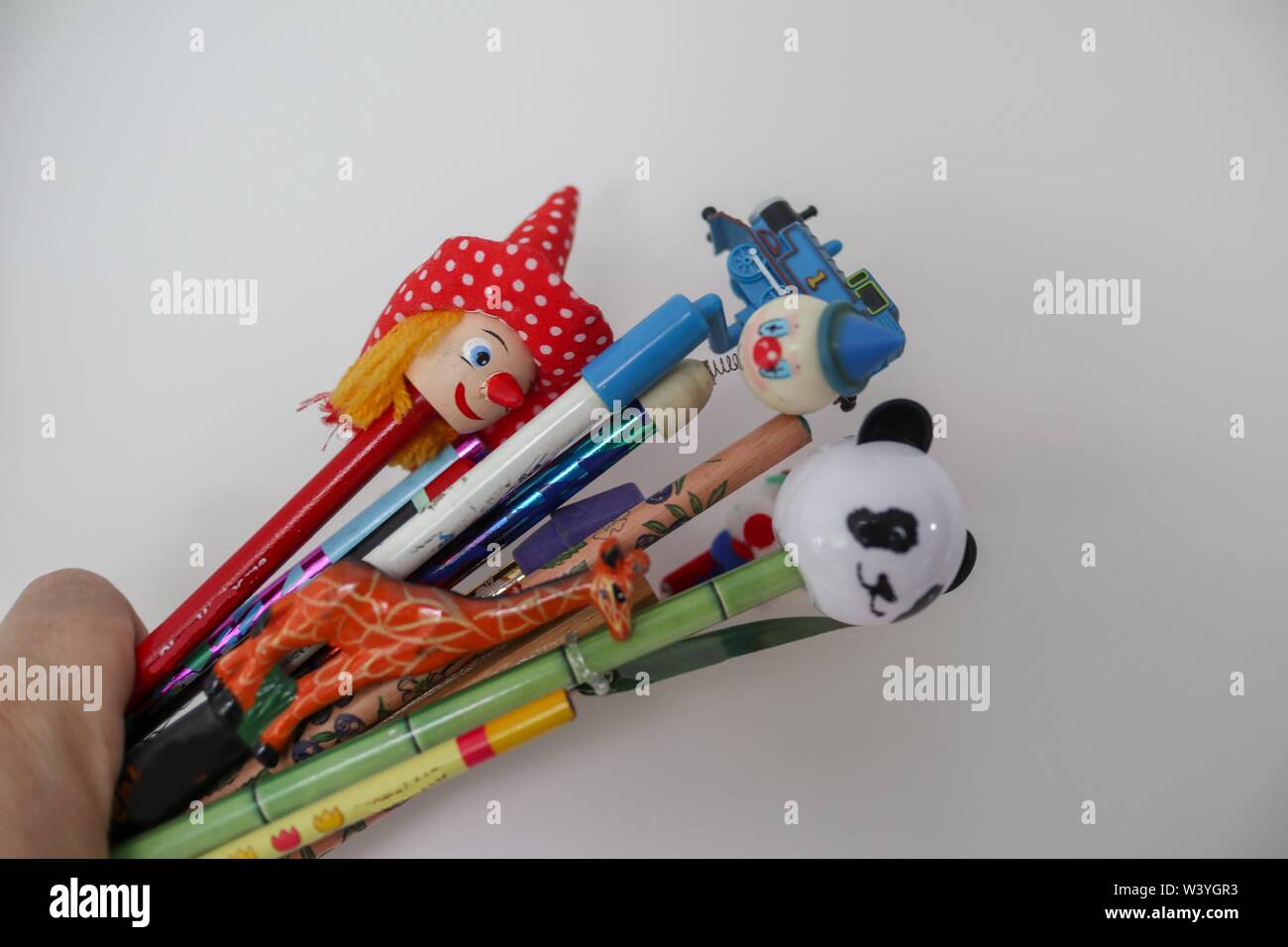 background, fun pencils and erasers for kids Stock Photo Alamy