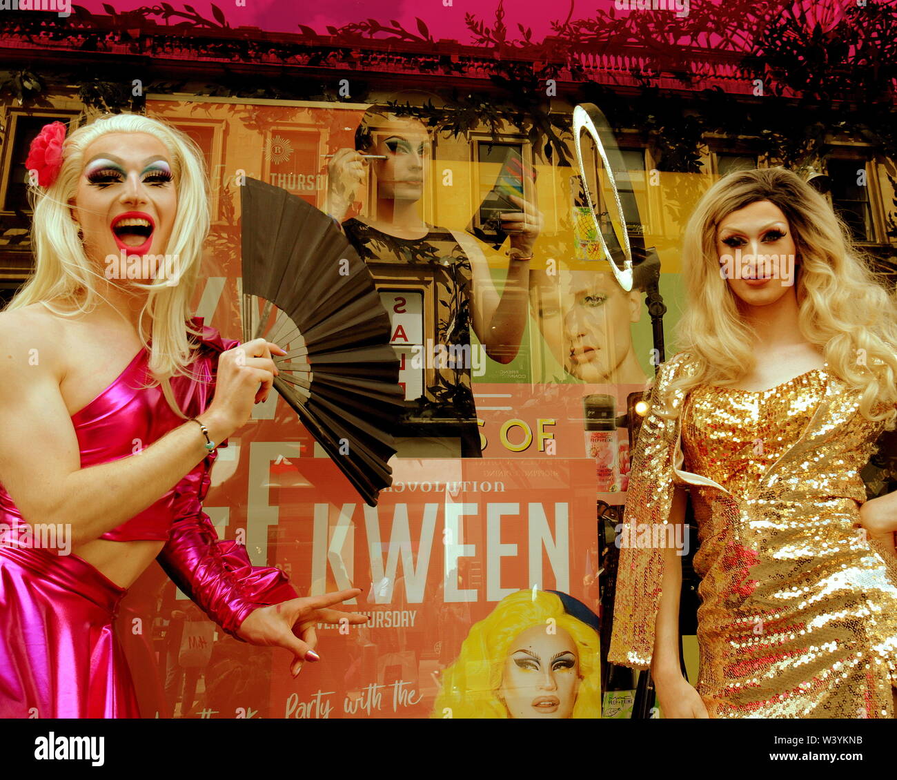 Glasgow, Scotland, UK 18th July, 2019. Lawrence Chaney Drag Queens on the  style mile of the city, Buchanan street, in partnership with MAC makeup at  House of Fraser distributing fruit drinks to