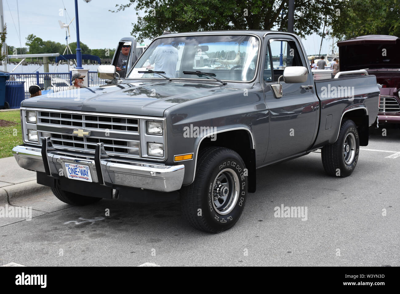 A restored 1986 Chevrolet Pickup  Truck on display at a car show. Stock Photo