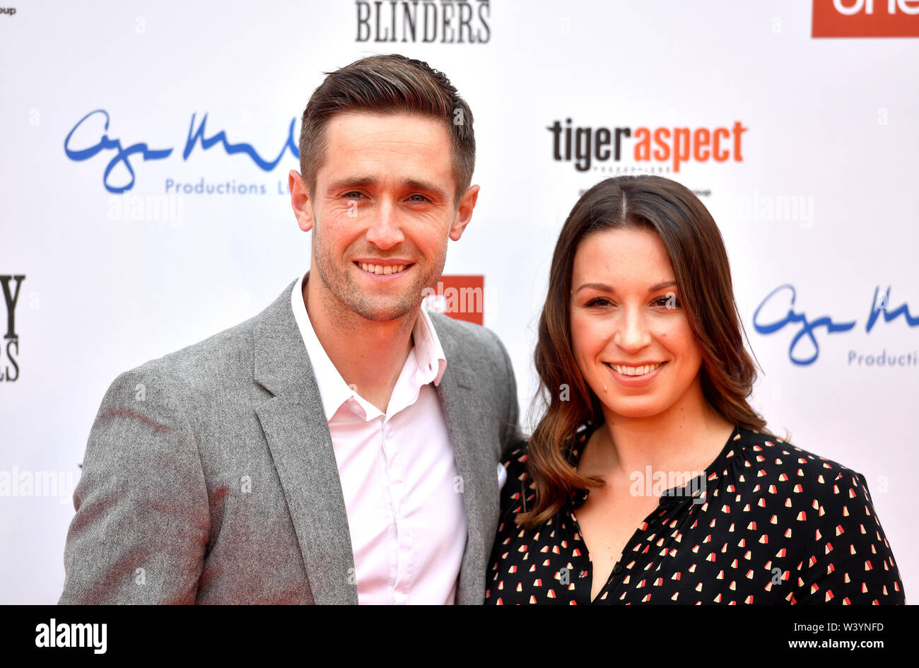 Chris Woakes and Amie Louise Woakes attending the Peaky Blinders Series Five World Premiere held at Birmingham Town Hall. Stock Photo