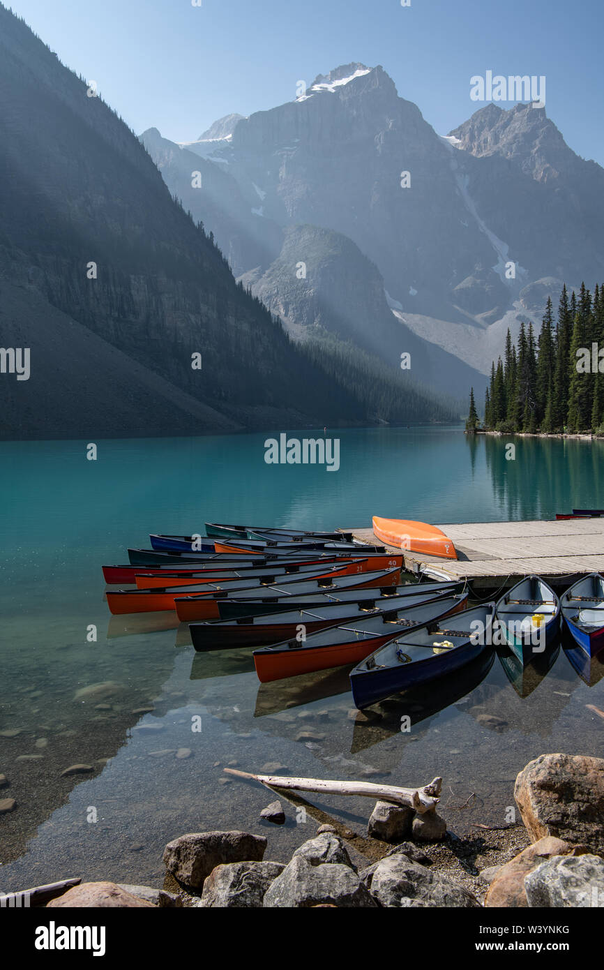 Canoes on Moraine Lake, Banff, Alberta Stock Photo