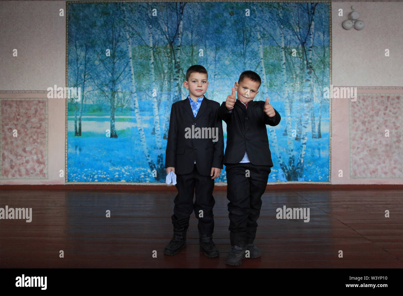Two schoolboys are playing and joking during a break at school. Radinka, Polesskiy district, Kiev Oblast, northern Ukraine, Europe Stock Photo