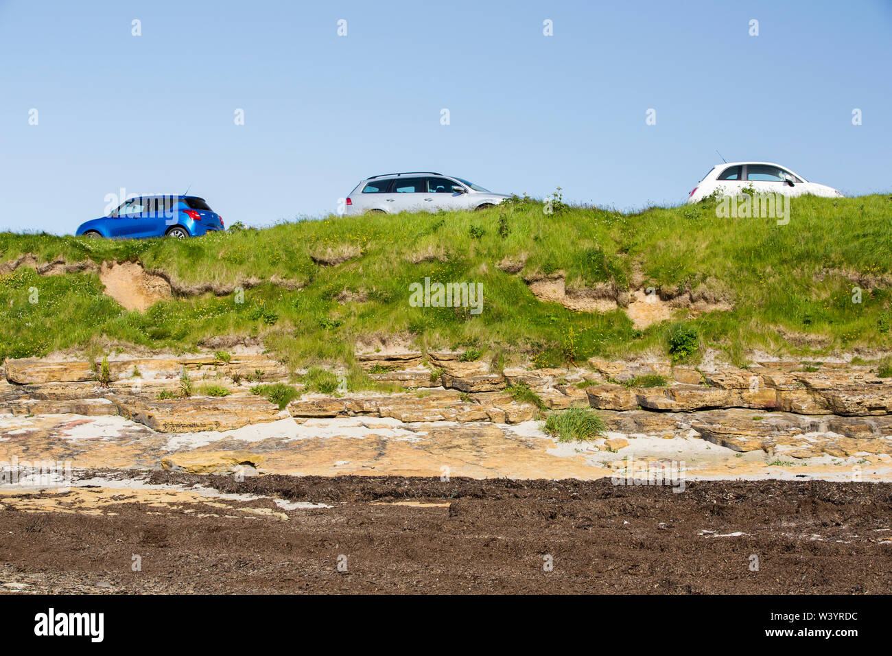 Cars parked above the Sands of Evie, Orkney, Scotland, UK. Stock Photo