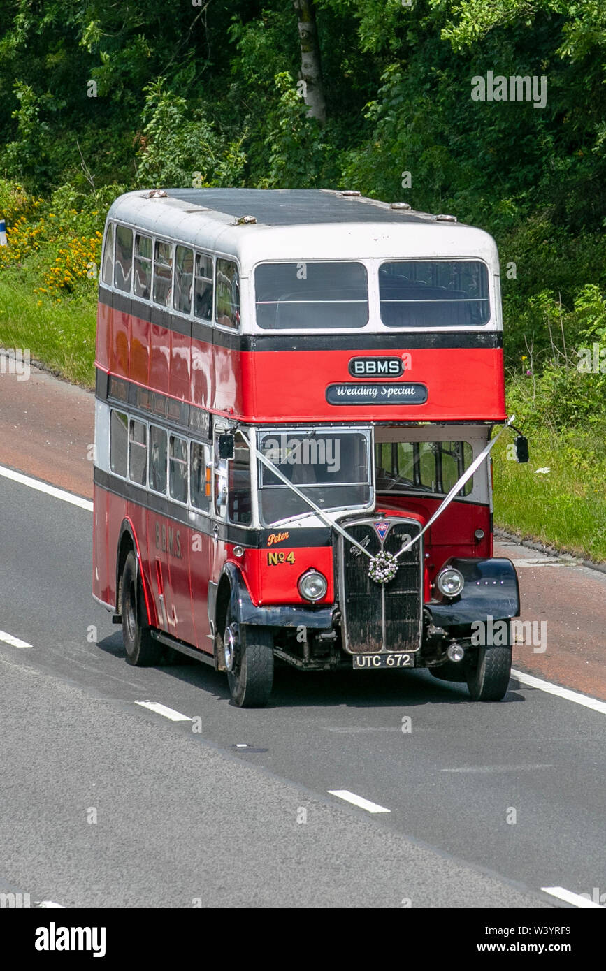 Leyland Aec Vintage Bus; Wedding Special UK Vehicular traffic, transport, classic, veteran, old buses, south-bound on the 3 lane M6 motorway highway. Stock Photo