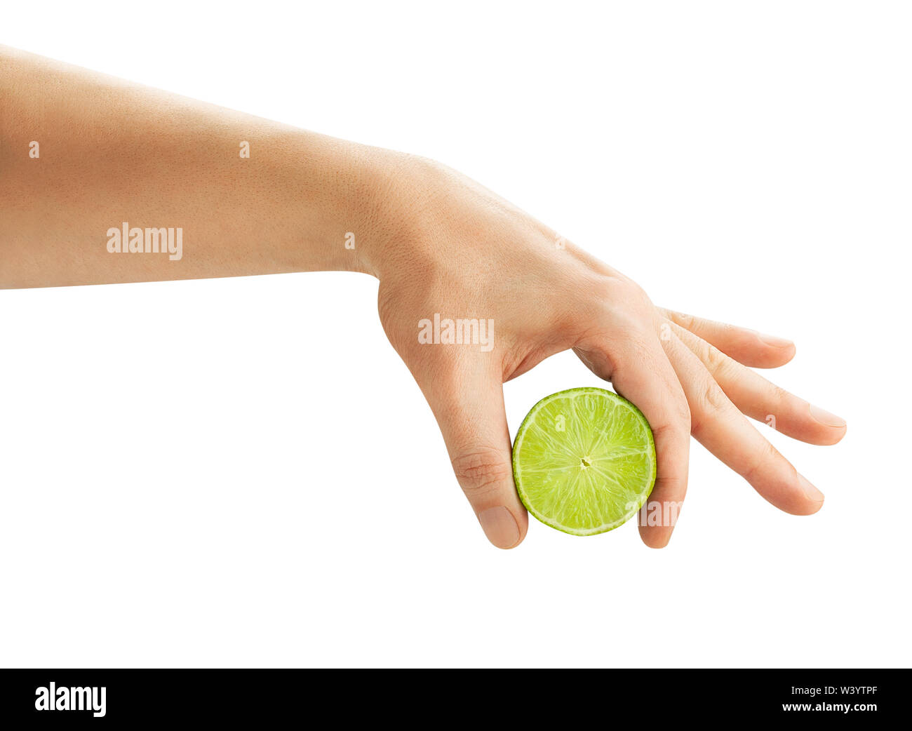 sliced lime in squeezing hand path isolated on white Stock Photo