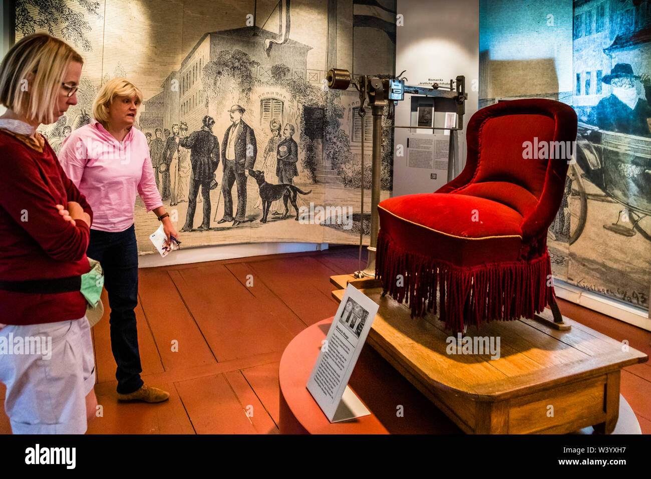 Scaling chair of former german chancellor Otto von Bismarck in Bad Kissingen, Germany. "Your Serene Highness, please take a seat" might have been the message when Prince Otto von Bismarck had his pounds counted on the cradle chair. The so-called Bismarck scale still stands today in the original Bismarck apartment in the Obere Saline Museum in Bad Kissingen. Stock Photo