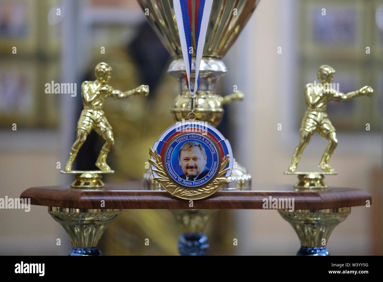 The image of Akhmad Kadyrov former Head of the Chechen Republic decorates a gilded boxing trophy displayed at Akhmat Kadyrov museum overwhelmingly a shrine to Akhmat and Ramzan Kadyrov in Grozny the capital city of Chechnya in the North Caucasian Federal District of Russia. Stock Photo