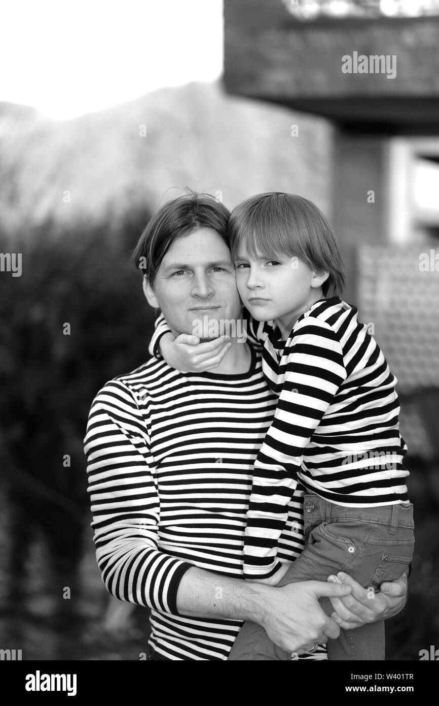 Portrait father adult son background Black and White Stock Photos ...