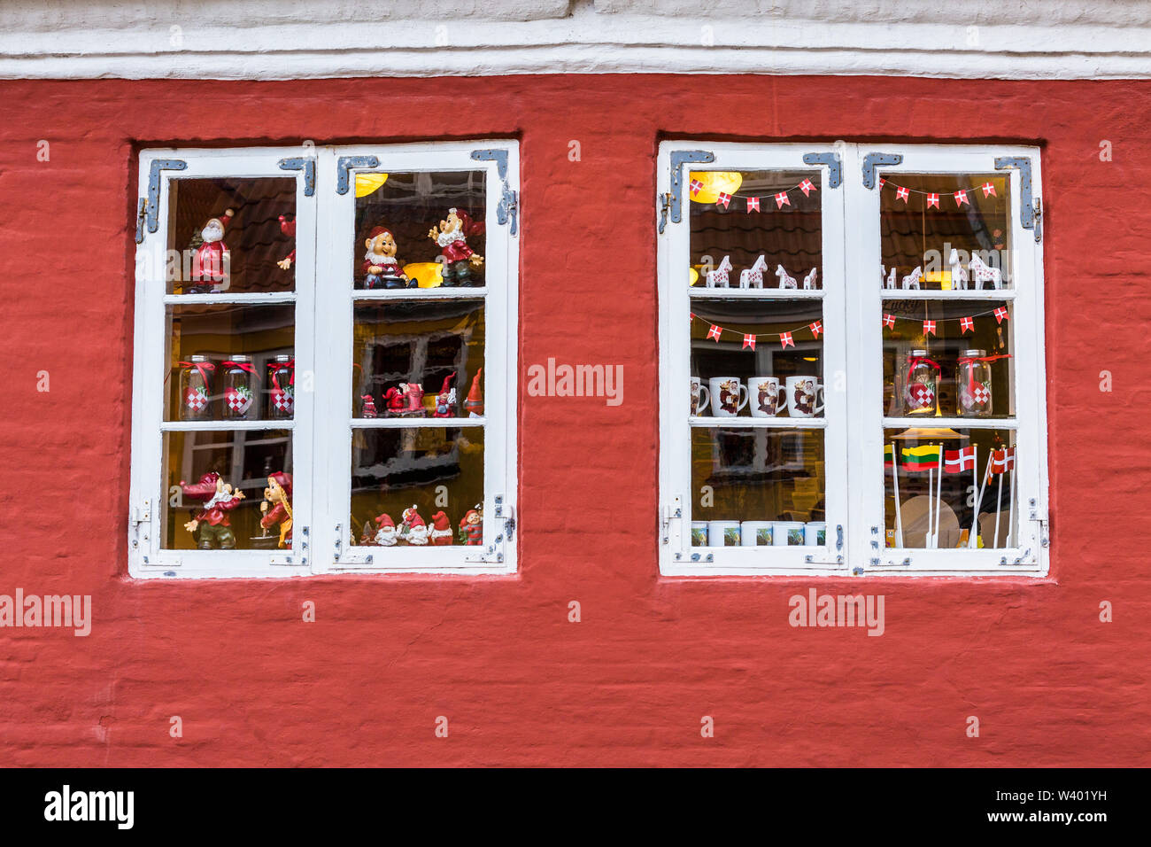 Close up of a red traditional building with two windows in Aeroskobing, Aero Island, Denmark Stock Photo