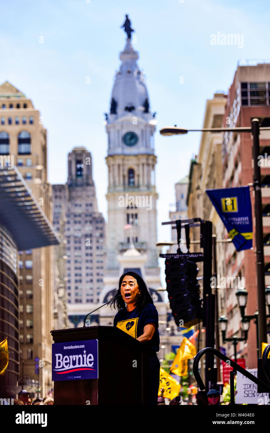 Philadelphia, Pennsylvania / USA. Philadelphia Councilwoman At-Large, Helen Gym, addresses hundreds from a podium in front of Hahnemann University Hospital in defence of health care workers. July 15, 2019. Photo Credit: Chris Baker Evens. Stock Photo