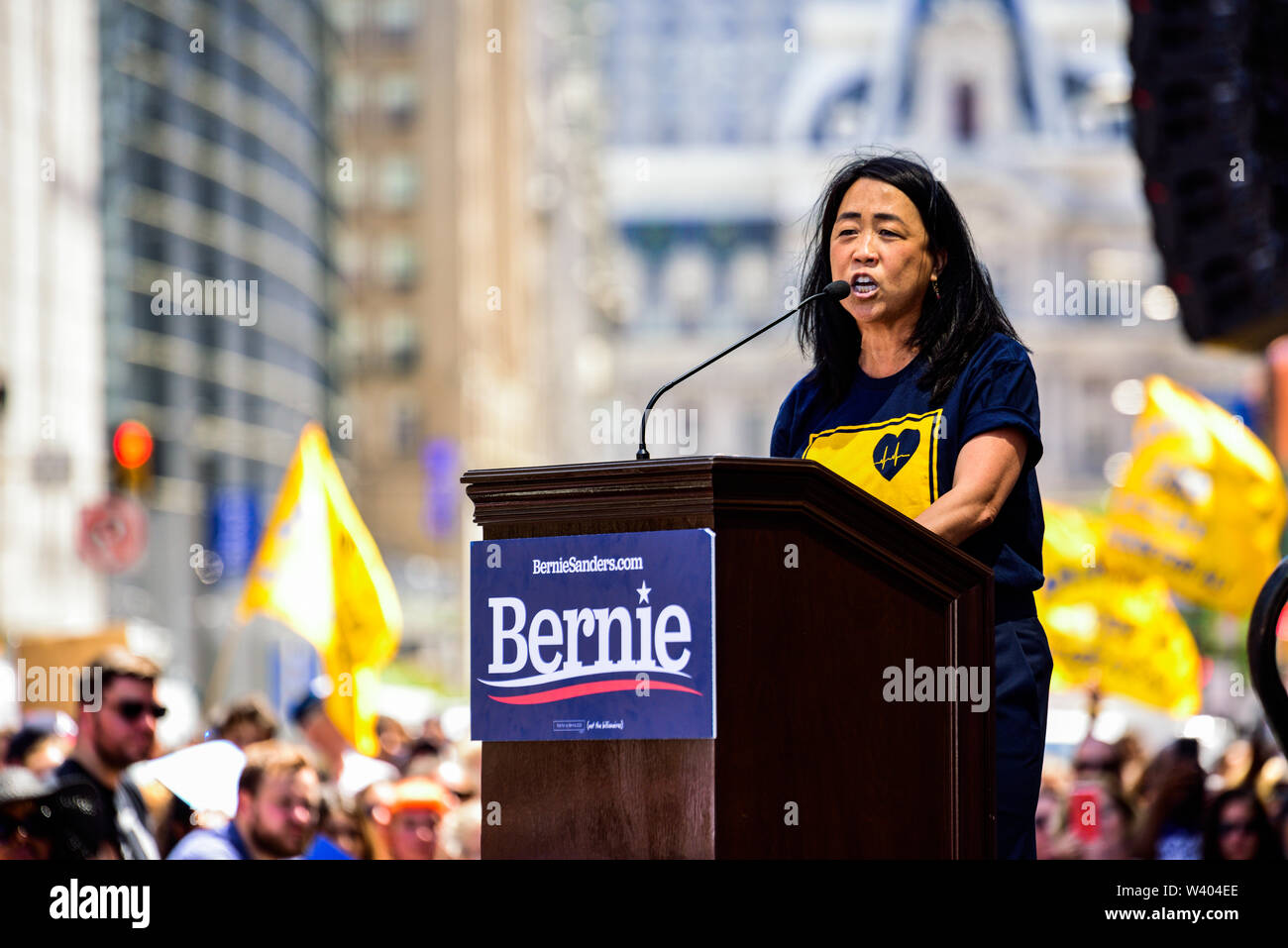 Philadelphia, Pennsylvania / USA. Philadelphia Councilwoman At-Large, Helen Gym, addresses hundreds from a podium in front of Hahnemann University Hospital in defence of health care workers. July 15, 2019. Photo Credit: Chris Baker Evens. Stock Photo