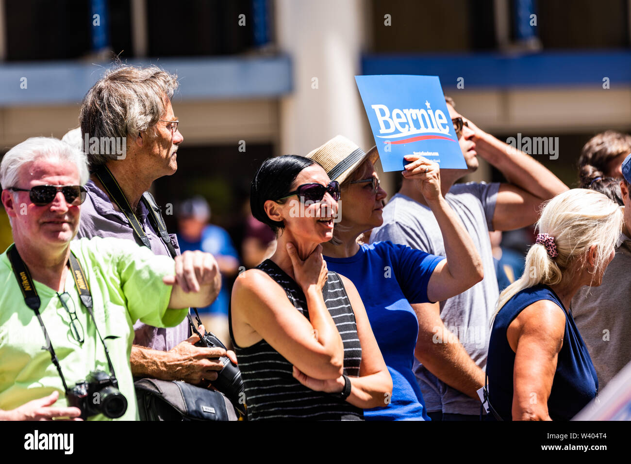 Philadelphia, Pennsylvania / USA. A single sign held by a woman reads 'Bernie' at a rally at Hahnemann University Hospital. July 15, 2019. Photo Credit: Chris Baker Evens. Stock Photo