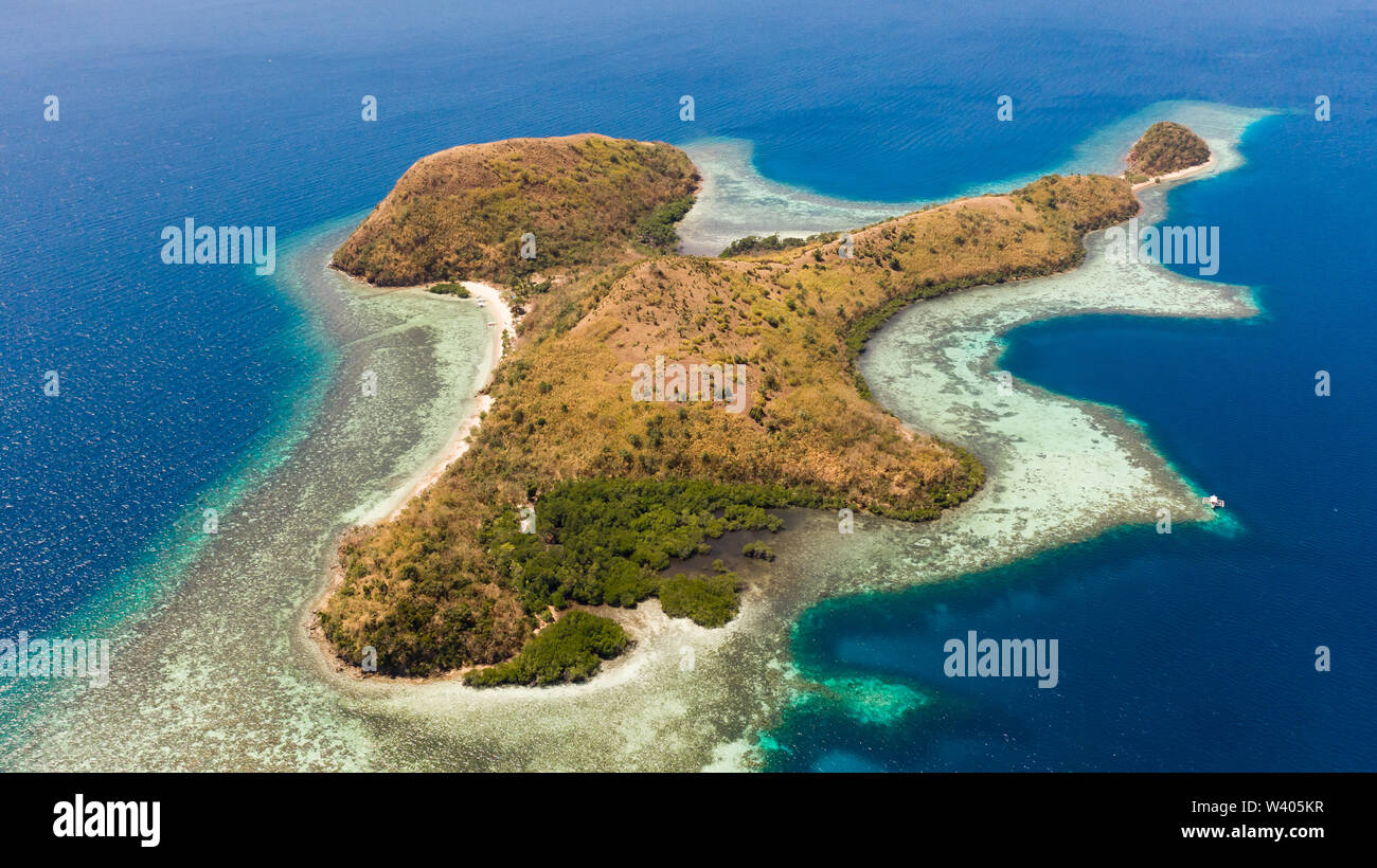 tropical island with coral reefs. Philippine Islands in clear weather aerial view.Philippines, Palawan Stock Photo