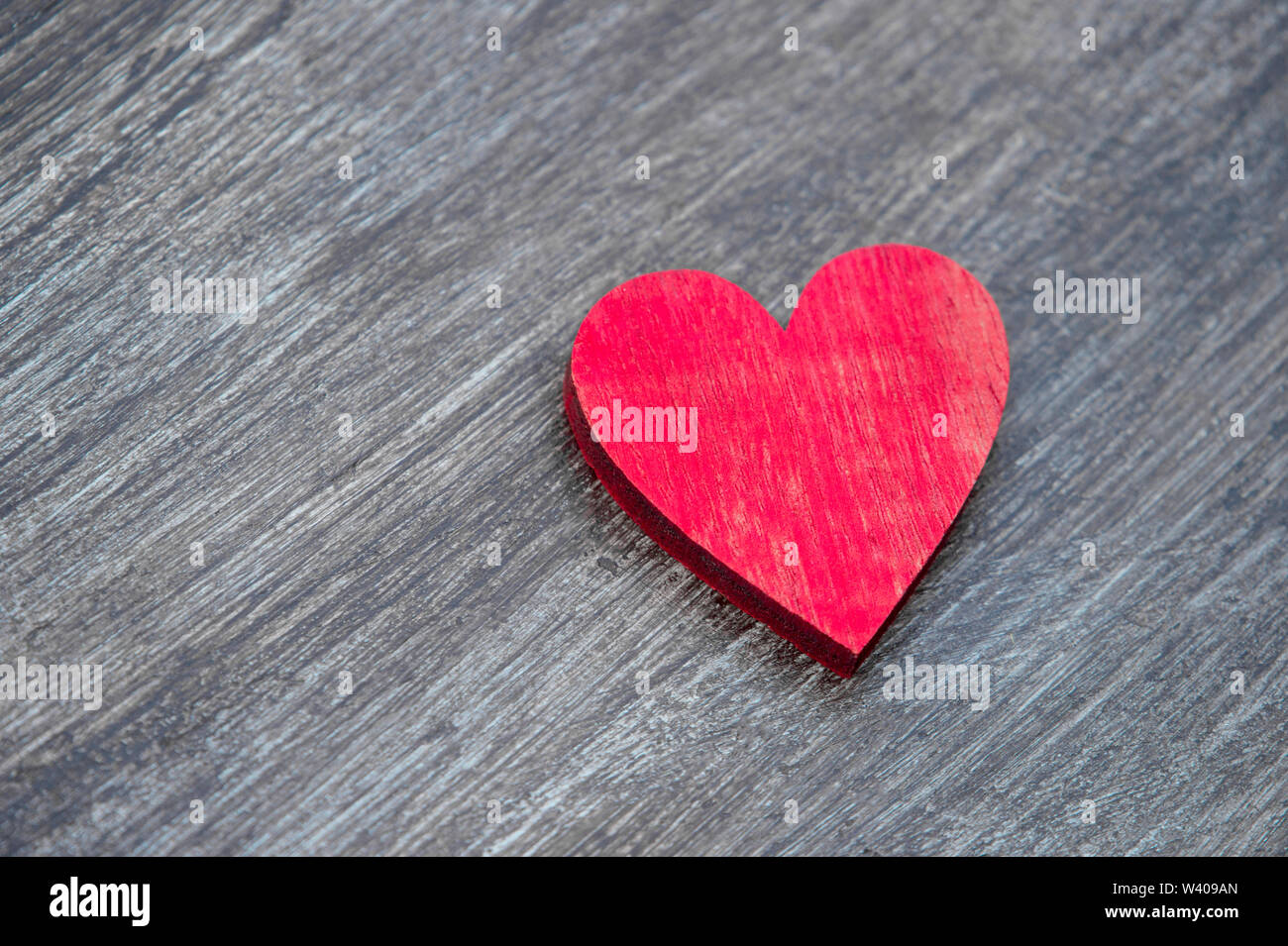 Red hearts on vintage wooden table top view. Saint Valentines day ...