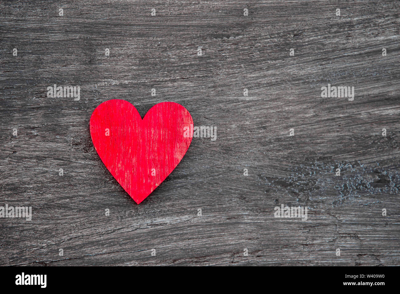 Red hearts on vintage wooden table top view. Saint Valentines day ...