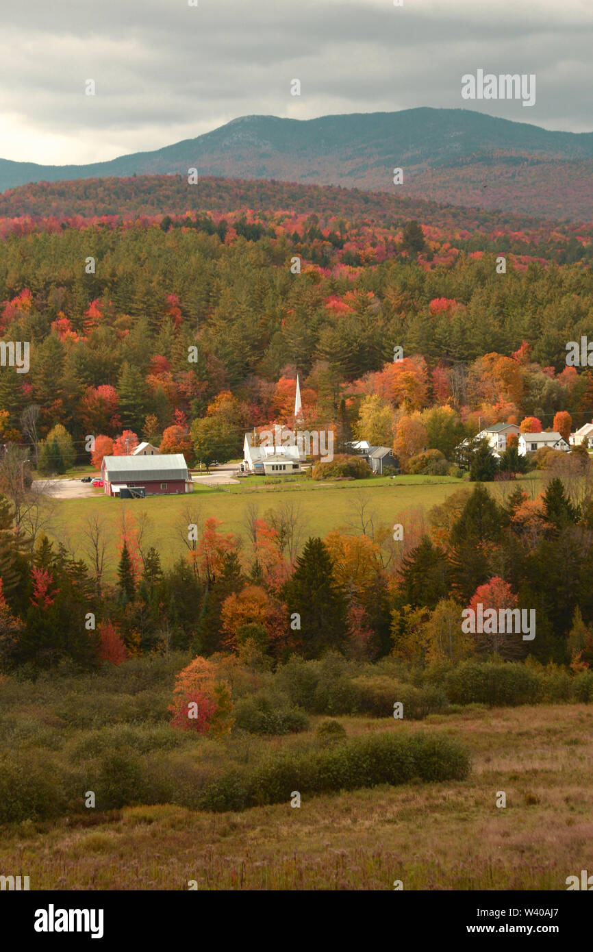 The town of Worcester, Vermont is viewed from a hill during foliage in Vermont. Stock Photo