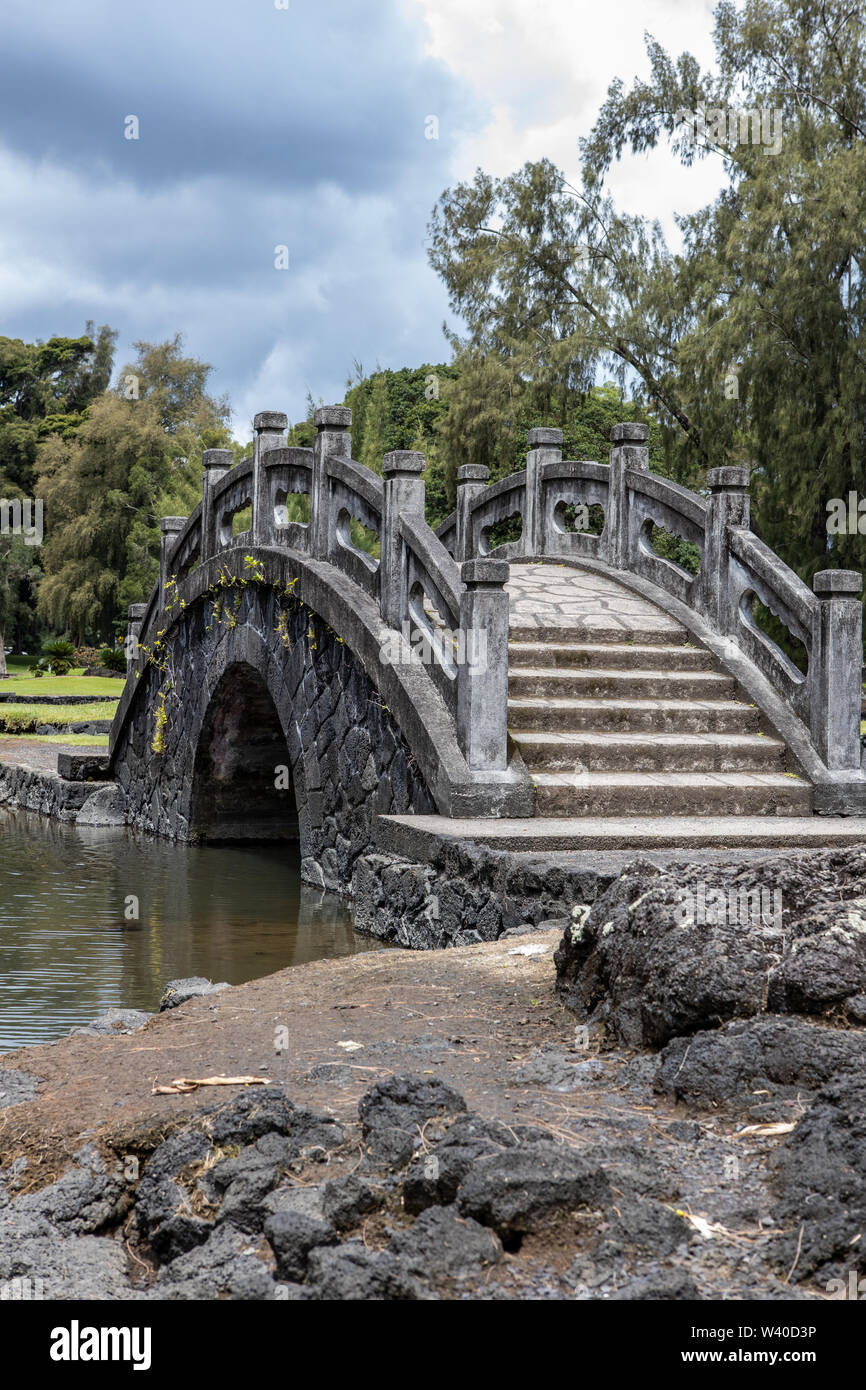 Stone bridge at the park in Hilo Hawaii Stock Photo