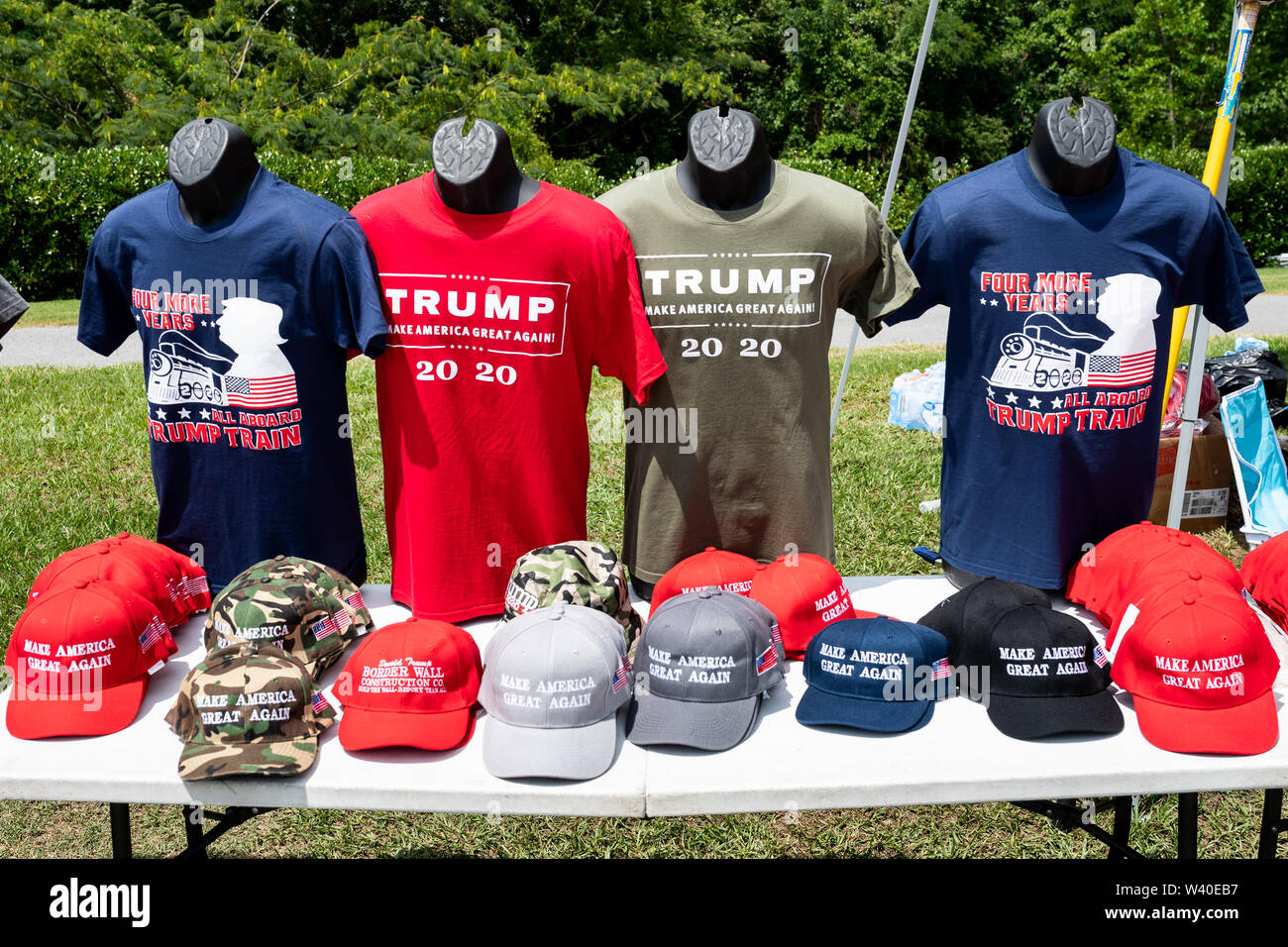 Vendors sell Trump related items outside of President Donald Trump’s Make America Great Again Rally at the Williams Arena in East Carolina University, Greenville. Stock Photo