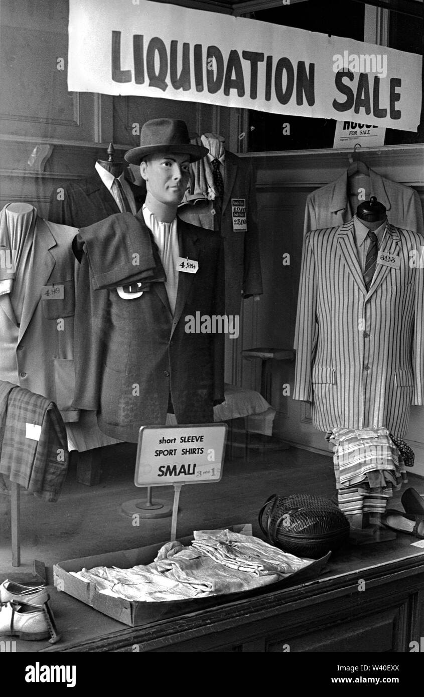 Closing down, shop window, Liquidation Sale going out business mens clothes shop. Manhattan, New York,1969, USA 60s US HOMER SYKES Stock Photo
