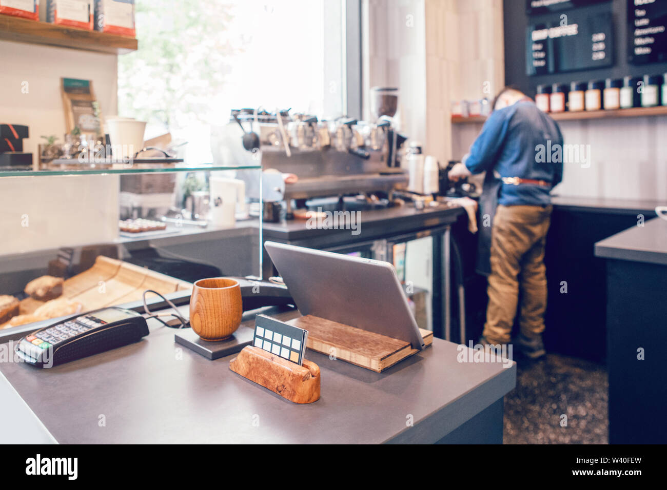 Interior design details of empty modern coffee shop restaurant at daytime with natural light