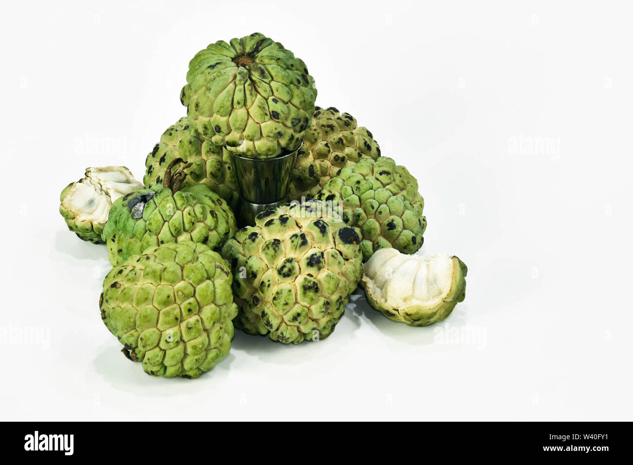 Exotic Brazilian fruit as known as 'Fruta do Conde or Fruta Pinha'. Scientific name: Annona squamosa. Stock Photo