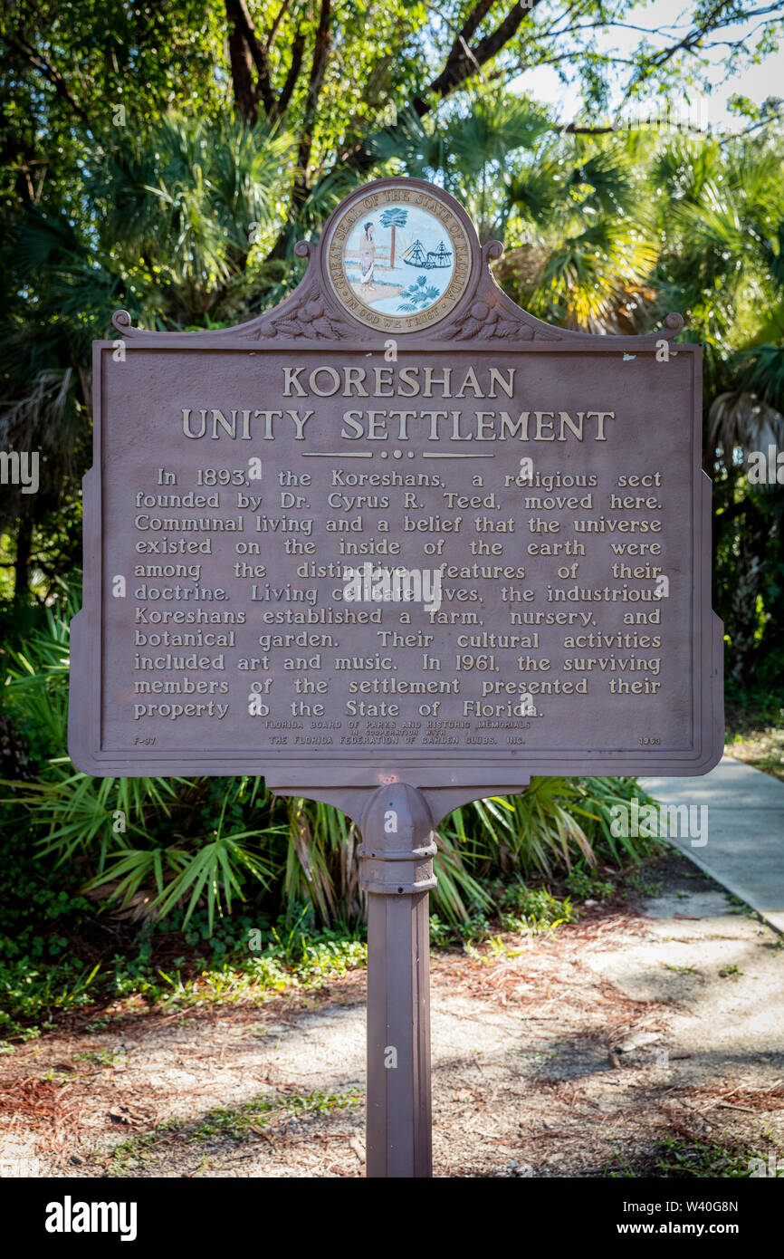Description marker on the grounds of Koreshan Historic Settlement - a 19th Century Utopian Commune, Estero, Florida, USA Stock Photo