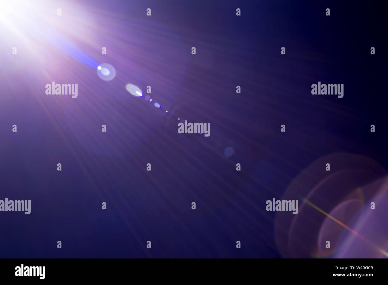Solar camera lens flare light create hexagon of objective iris shapes ...