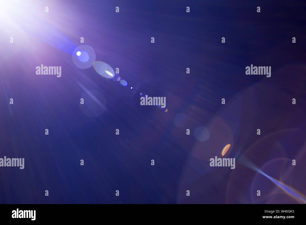 Solar camera lens flare light create hexagon of objective iris shapes ...