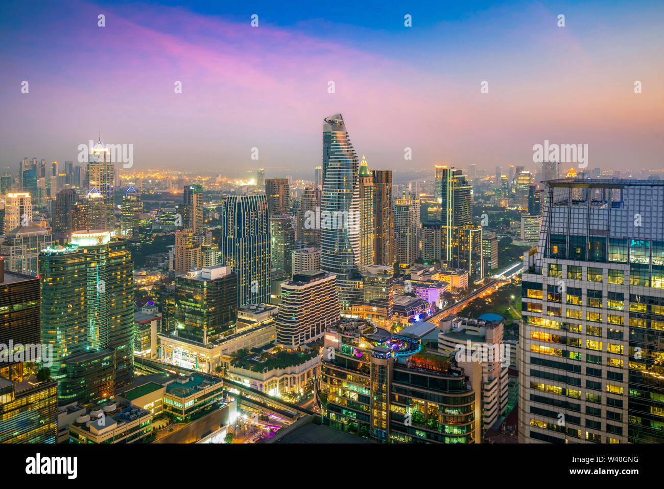 Modern building in Bangkok business district at Bangkok city with skyline in night, Thailand. Stock Photo
