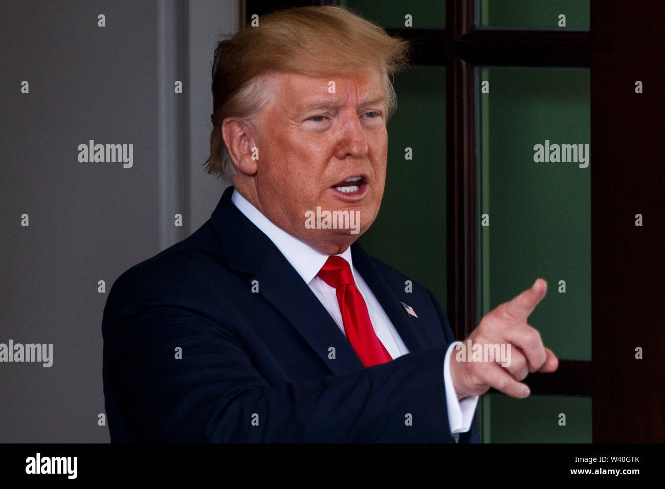 Washington, USA. 18th July, 2019. U.S. President Donald Trump speaks to the media at the White House in Washington, DC, the United States, on July 18, 2019. Donald Trump announced on Thursday that a U.S. warship destroyed an Iranian drone in the Strait of Hormuz. Speaking at the White House, Trump said that USS Boxer, an amphibious assault ship of the U.S. Navy, destroyed the drone that threatened the U.S. warship by flying within 1,000 yards of it. Credit: Ting Shen/Xinhua/Alamy Live News Stock Photo