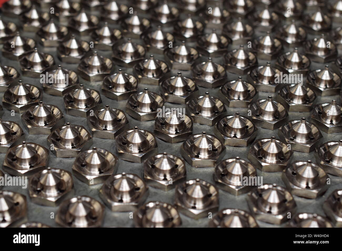 Tip for paint spray gun manufacture for CNC machine. Detail of spray