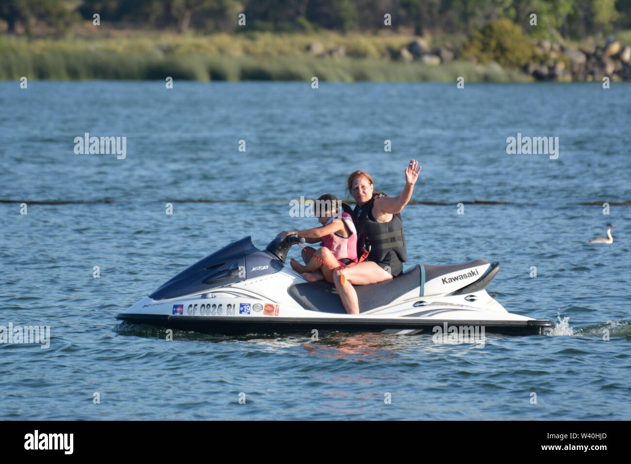 People on jet skis in Clear Lake Clearlake California learning and