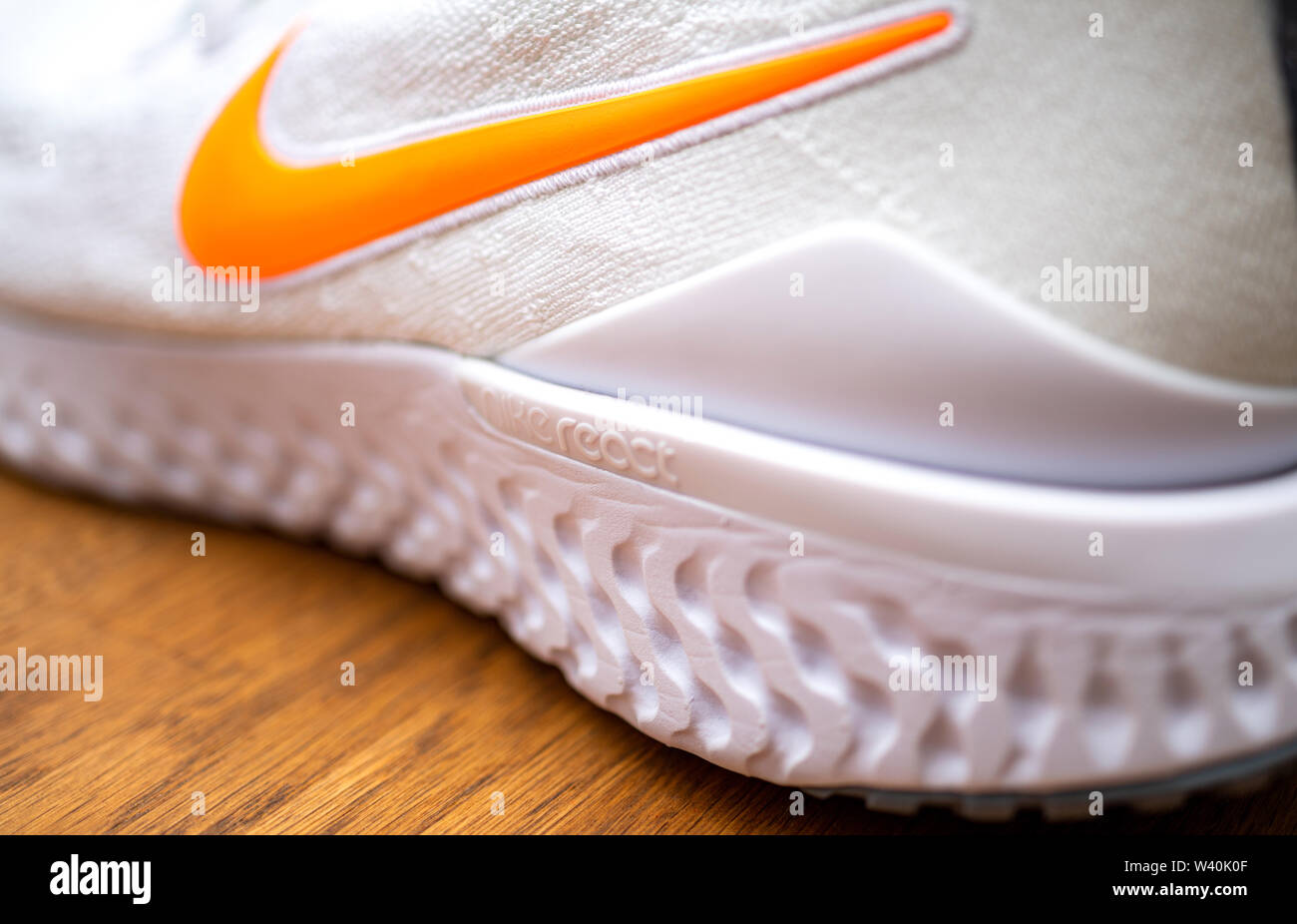 Paris, France - Jul 8, 2019: Side view of new Nike Zoom Fly Flyknit 2  running shoes on wooden table detail of sole and logotype Stock Photo -  Alamy