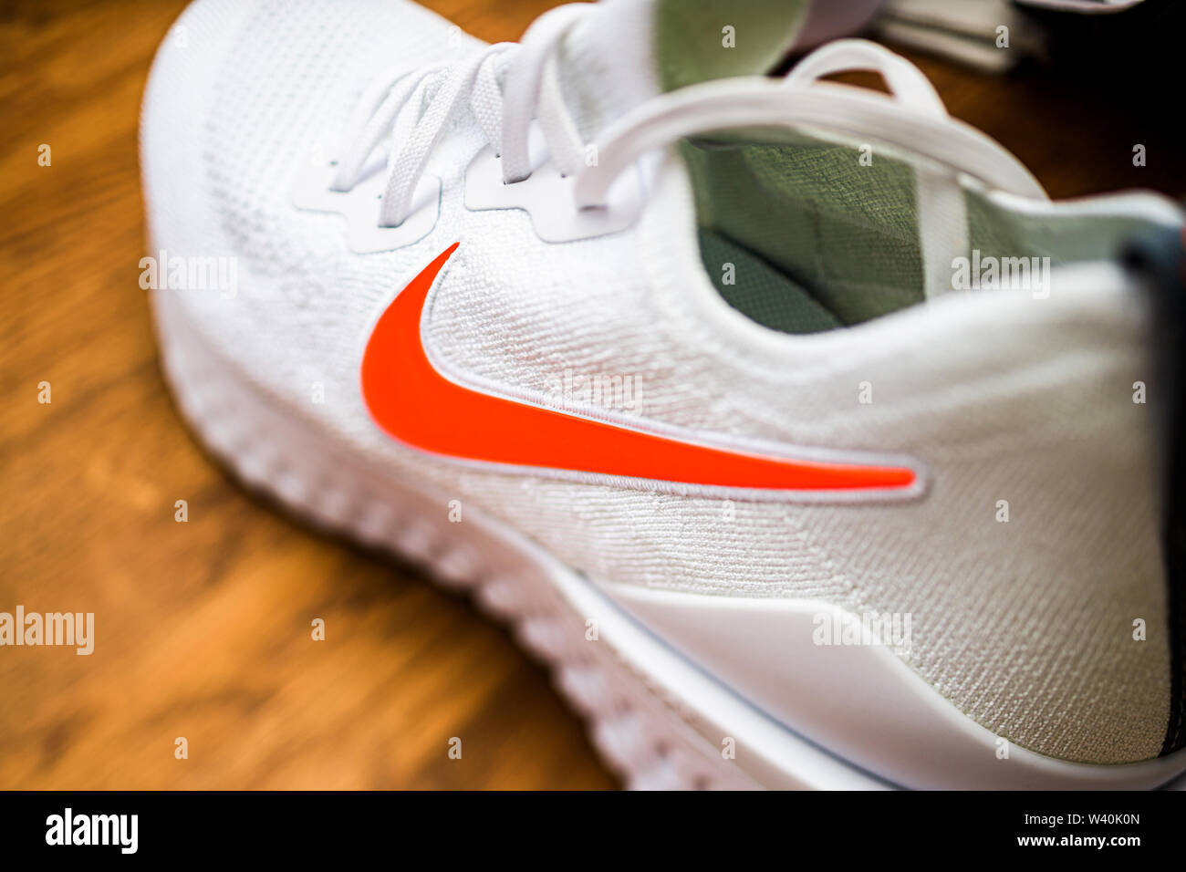 Paris, France - Jul 8, 2019: Side view of new Nike Zoom Fly Flyknit 2  running shoes on wooden table - includes the NIke logotype insignia Stock  Photo - Alamy