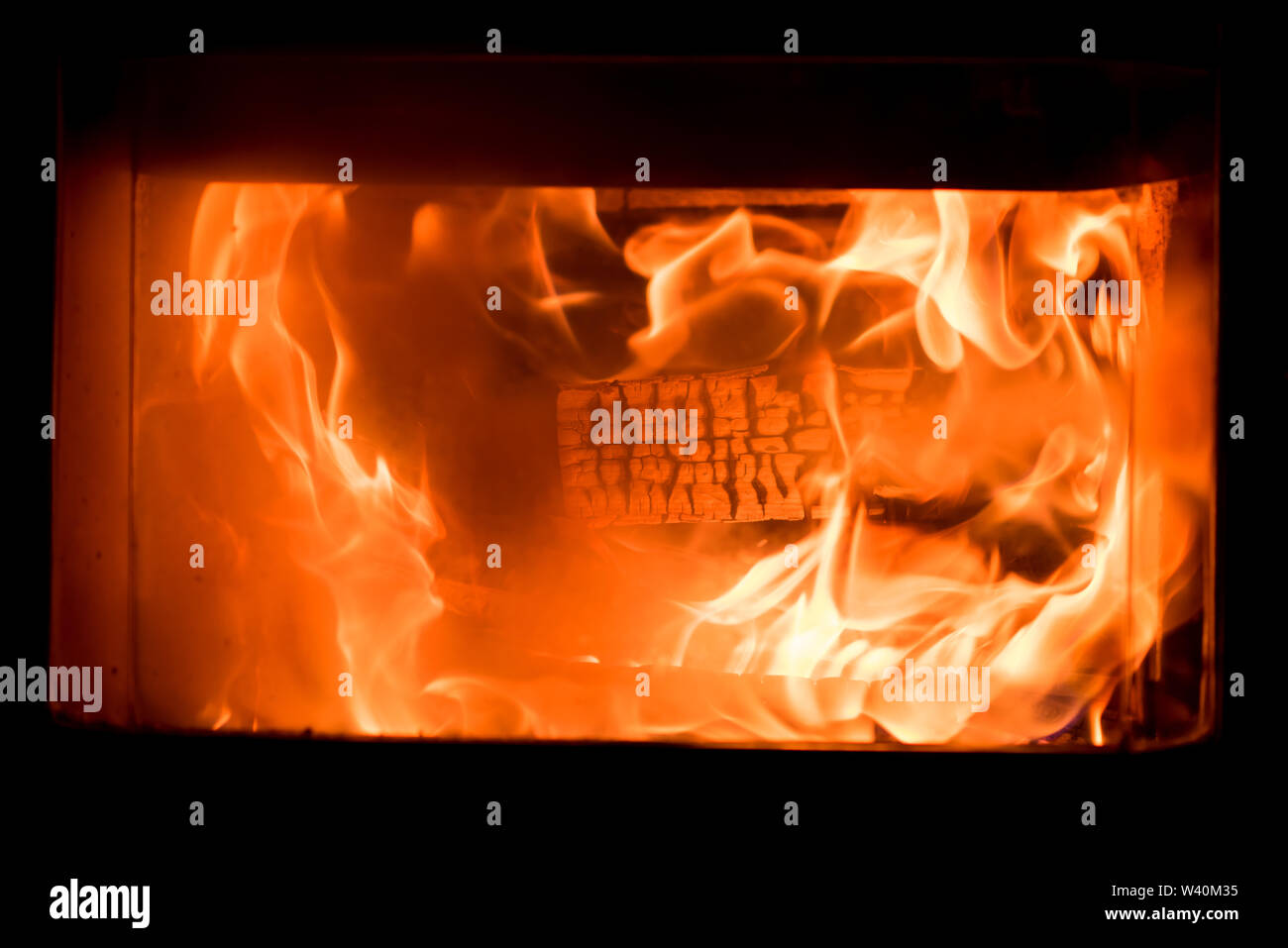 Fire background Burning firewood in the fireplace close up Stock Photo ...