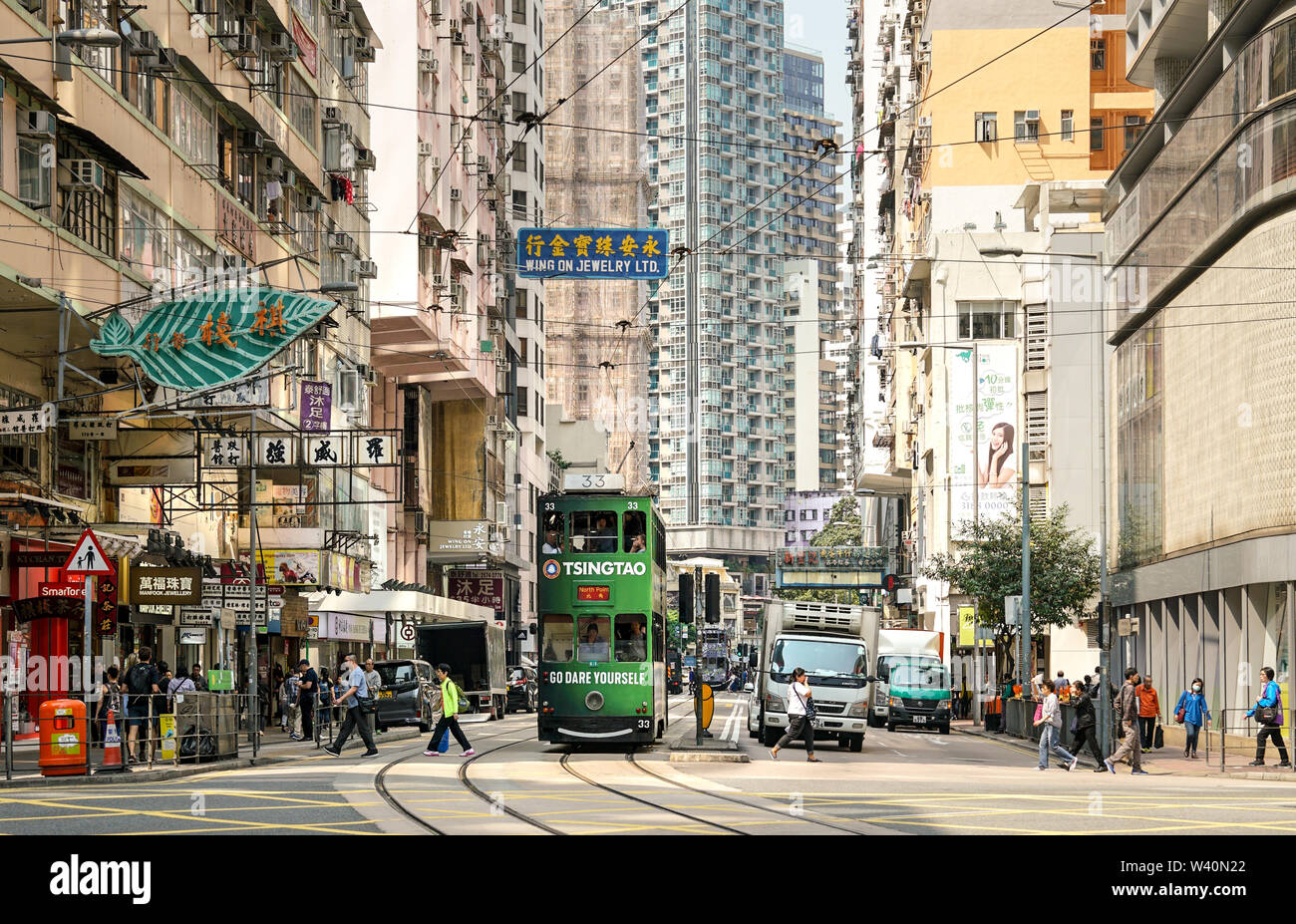 Wan Chai, Hong Kong-March 16, 2018: Hong Kong trams or Ding Ding. The tram system is one of the earliest public transport, having opened in 1904. Very Stock Photo