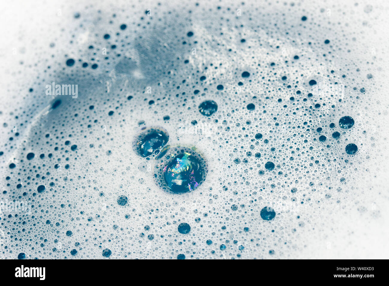 soap foam an bubbles on water background selective focus Stock Photo