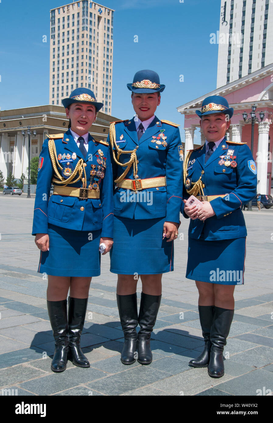 Uniformed femaire and emergency services personnel prepare to parade in Sukhbaatar Square, Ulaanbaatar (Ulan Bator) the Mongolian capital Stock Photo