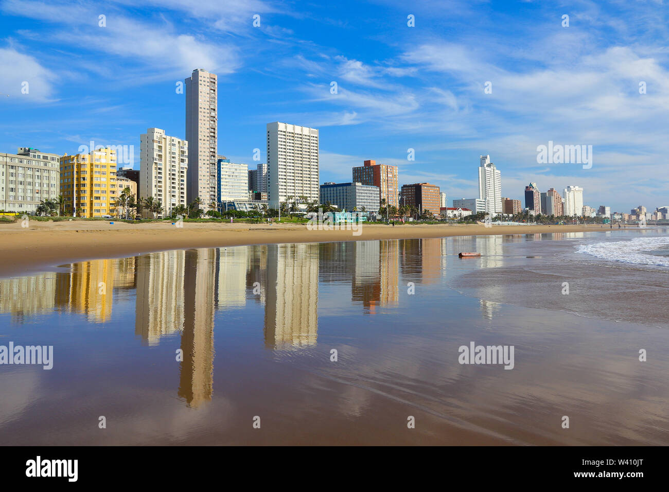 Reflection of Durban 'Golden Mile' beachfront in the Indian Ocean, KwaZulu-Natal province of South Africa Stock Photo