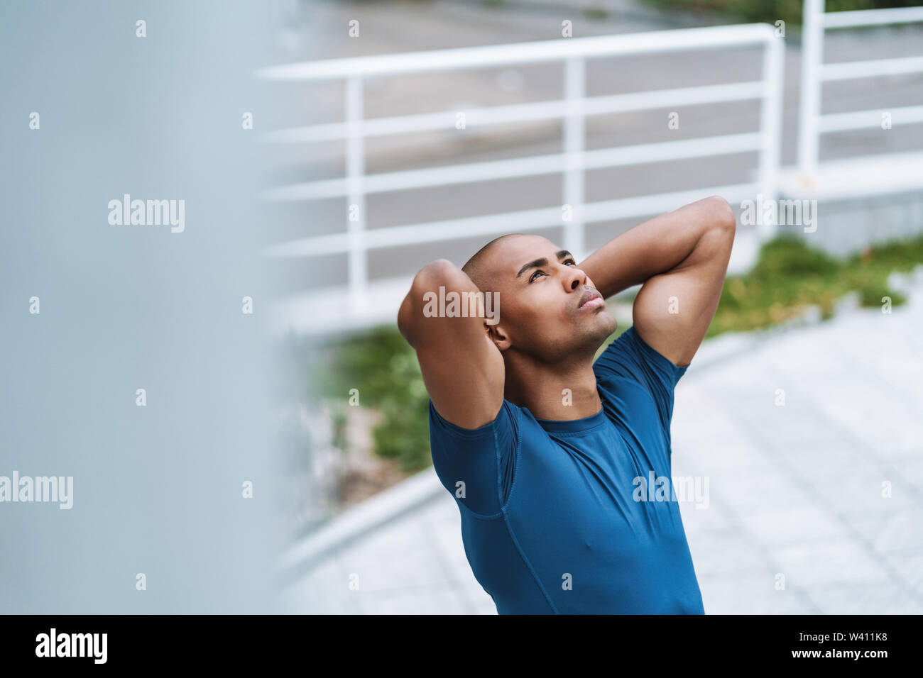 Handsome senior man stretching hi-res stock photography and images - Alamy