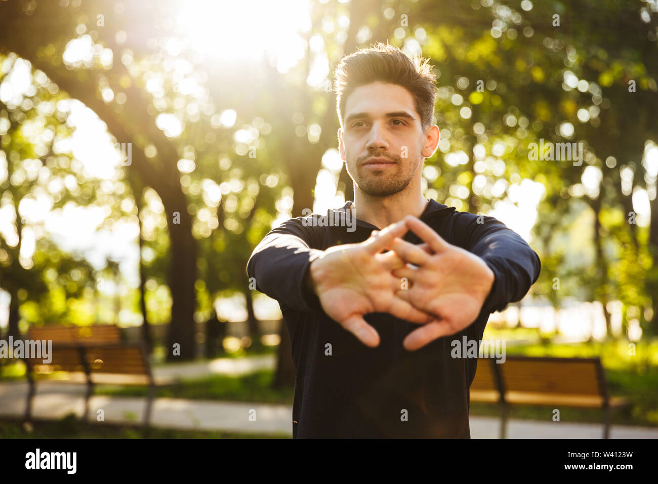 Exercises his arms hi-res stock photography and images - Alamy