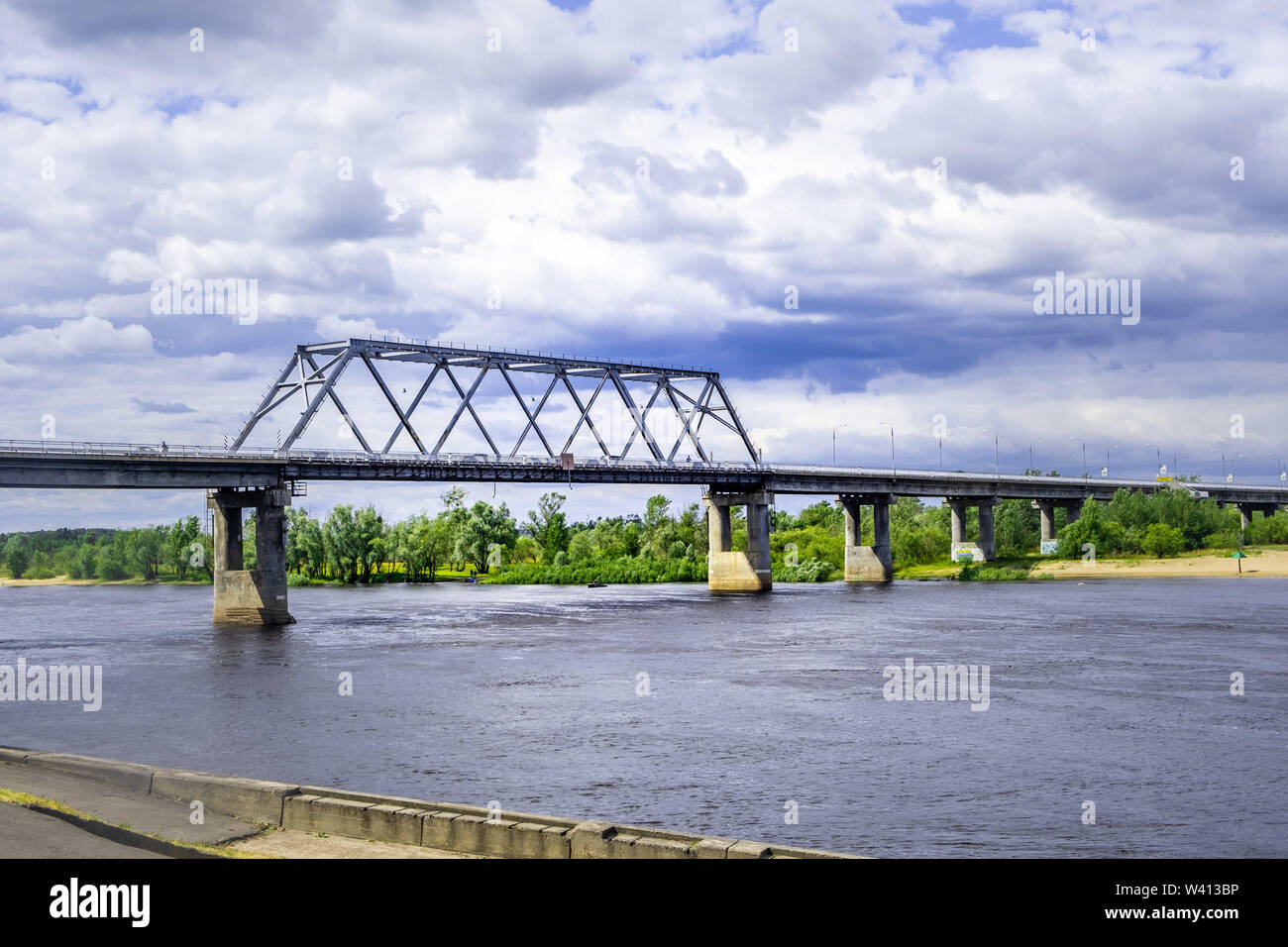 Cars driving on bridge over Pripyat river in Belarus Stock Photo