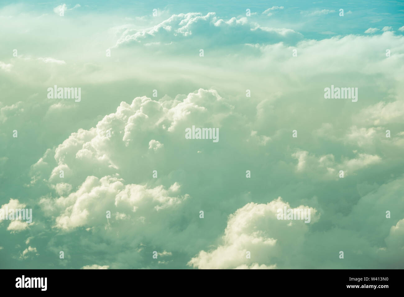 Aerial view looking down at beautiful fluffy clouds Stock Photo - Alamy